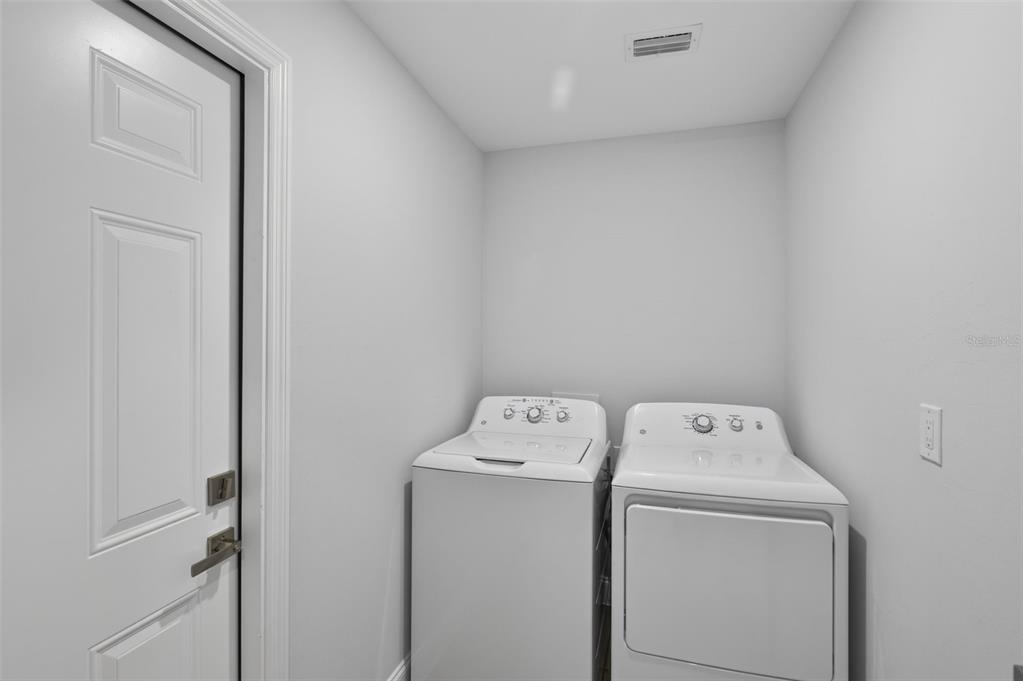 375 Denver Drive Port Charlotte, FL 33954 - Photo 21 of 37 a utility room with dryer and washer