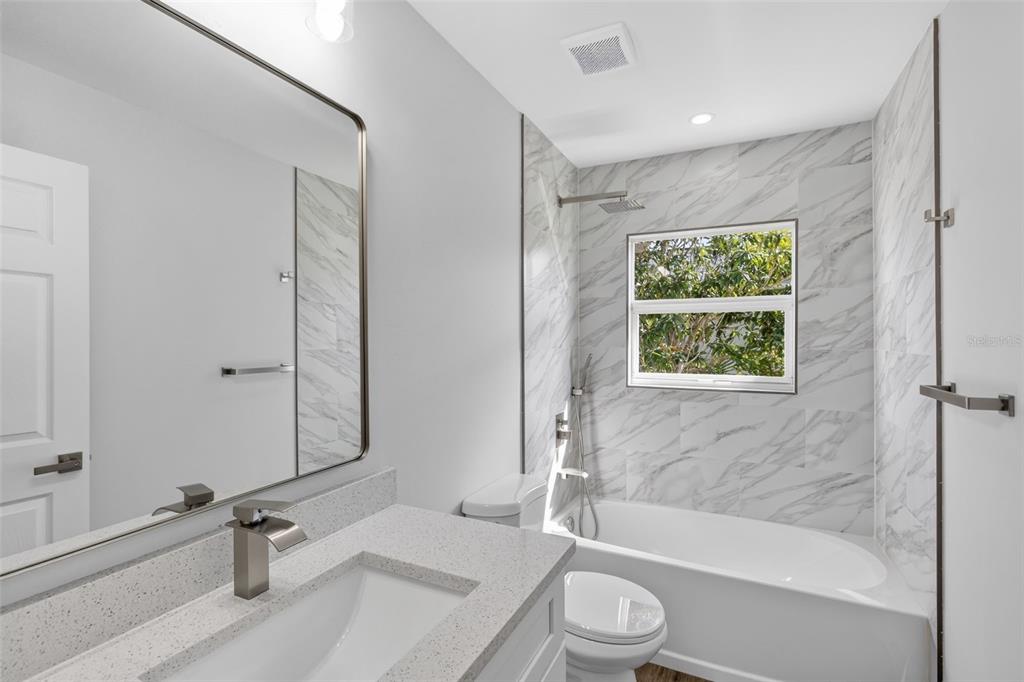 375 Denver Drive Port Charlotte, FL 33954 - Photo 24 of 37 a bathroom with a sink toilet and shower