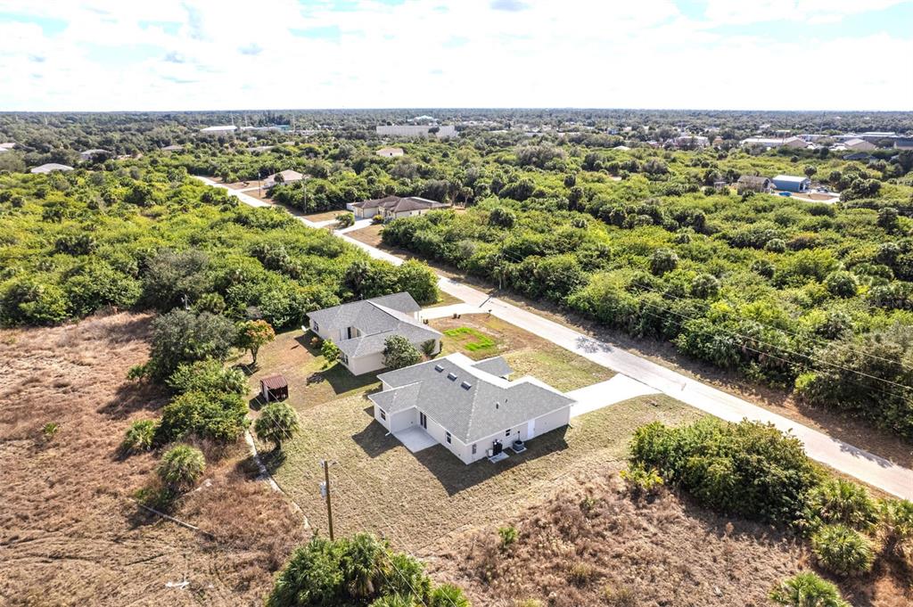 375 Denver Drive Port Charlotte, FL 33954 - Photo 32 of 37 an aerial view of residential house with outdoor space