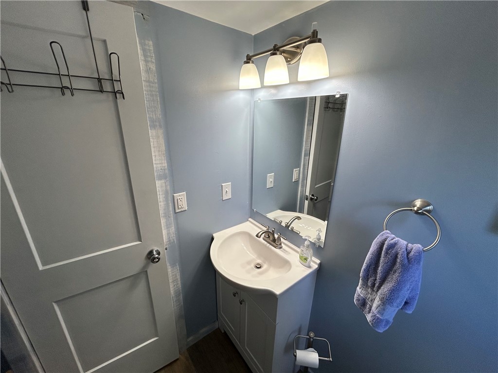 43 Sunset Cove Road Abbeville, SC 29620 - Photo 13 of 41 This clean and functional bathroom offers essential amenities for comfort and convenience.