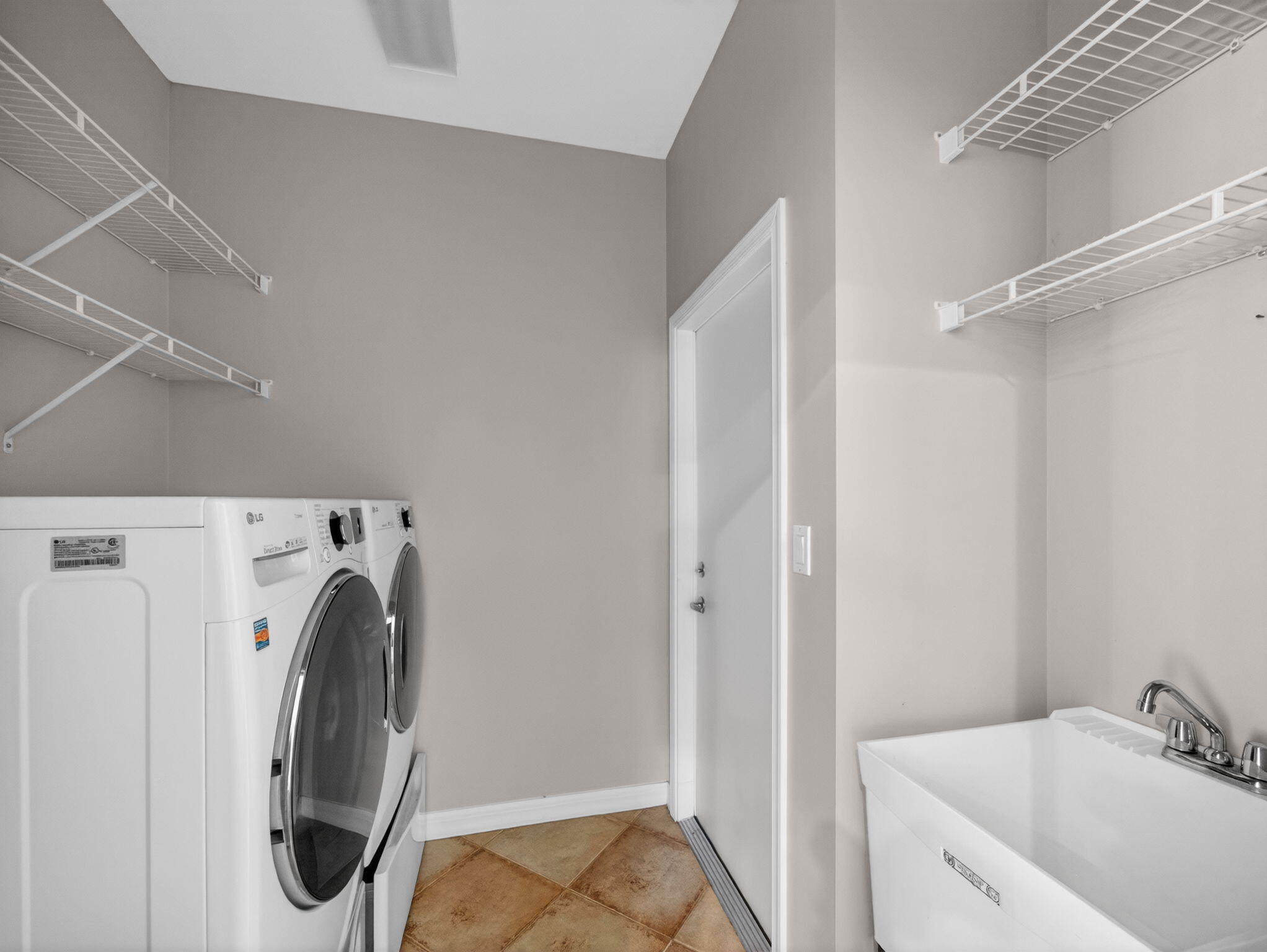 3008 Southeast Racoon Way Stuart, FL 34997 - Photo 26 of 32 Laundry room