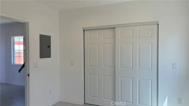 a bathroom with a shower and a sink