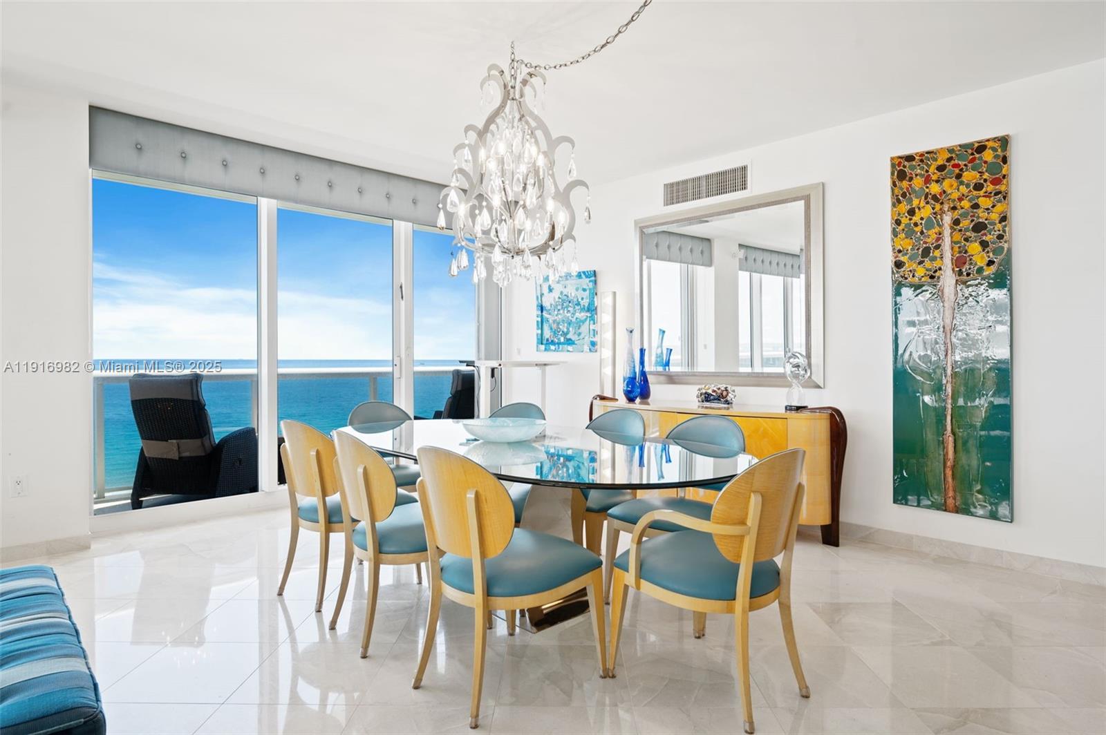 9595 Collins Avenue, Unit N8A Surfside, FL 33154 - Photo 7 of 25 a view of a dining room with furniture window and outside view