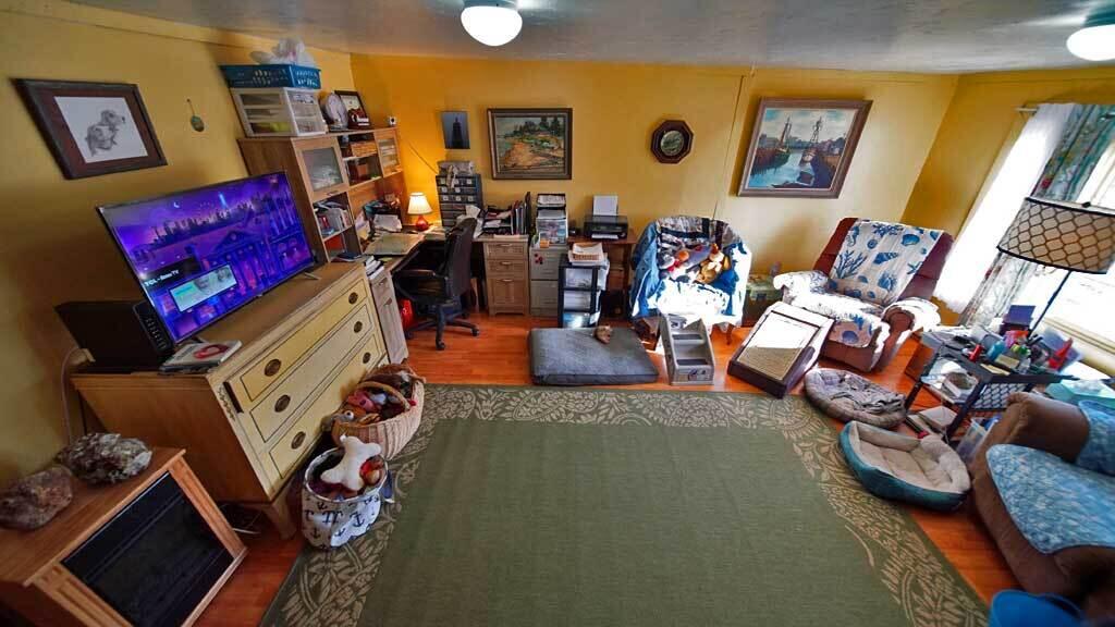 57 Old Patten Road Island Falls, ME 04747 - Photo 18 of 49 living-room-57-old-patten