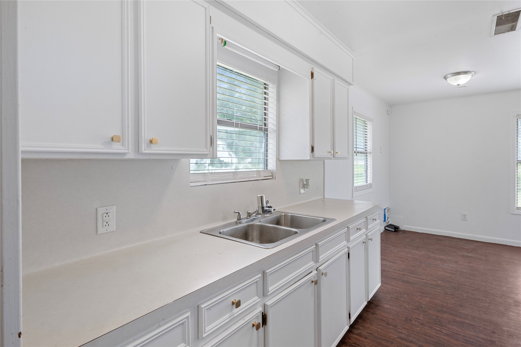 139 Holly Ridge Onalaska, TX 77360 - Photo 15 of 23 a kitchen with stainless steel appliances granite countertop white cabinets and a sink