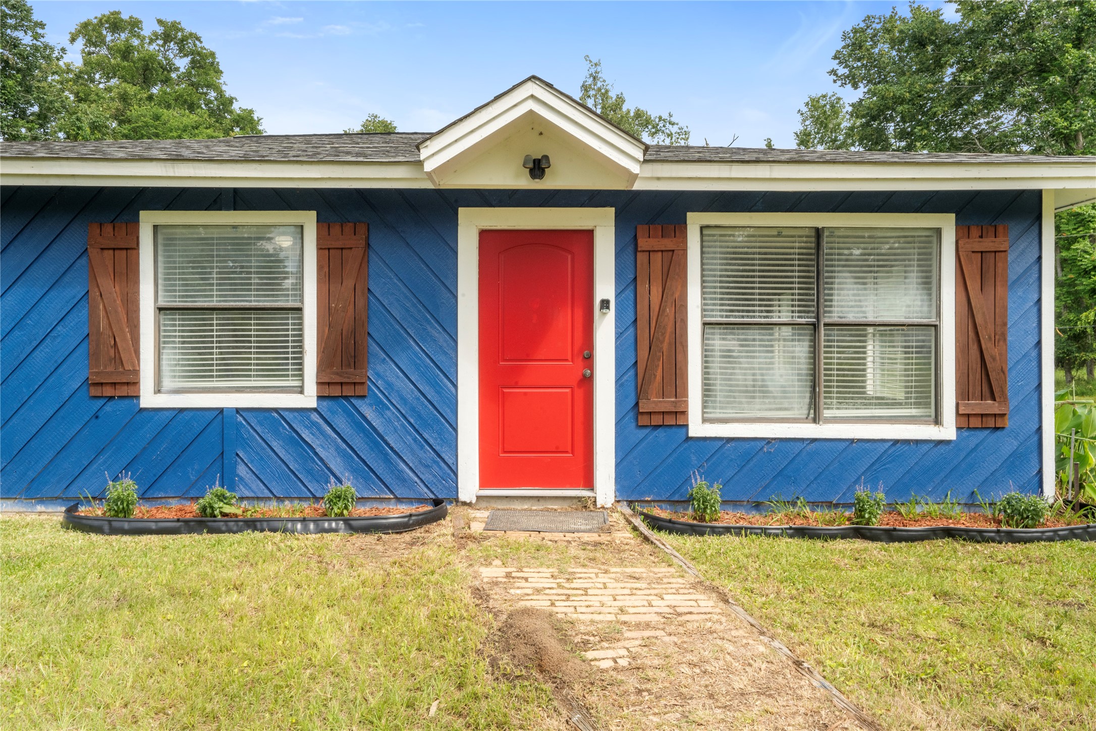 139 Holly Ridge Onalaska, TX 77360 - Photo 22 of 23 a view of front door of house