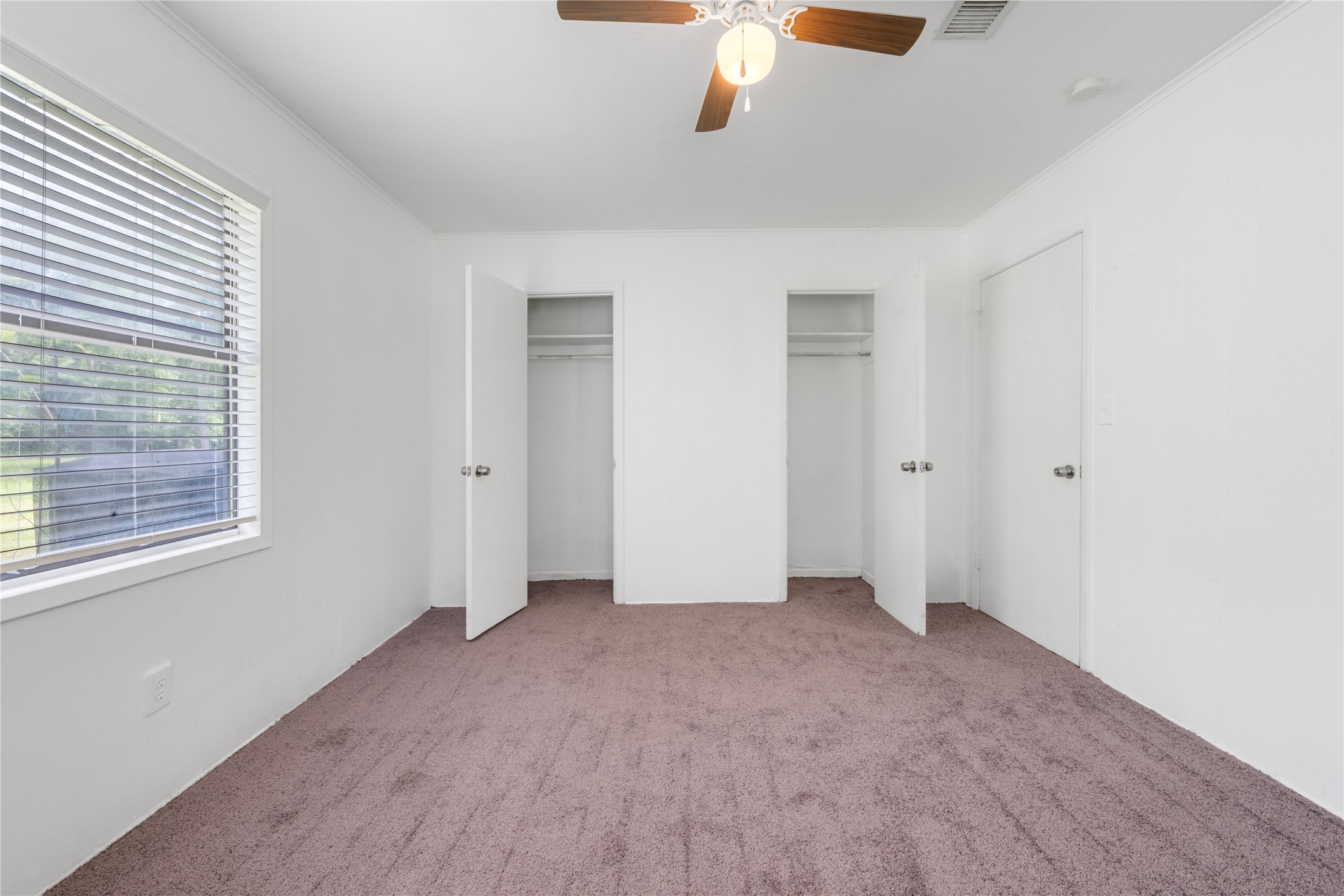 139 Holly Ridge Onalaska, TX 77360 - Photo 9 of 23 an empty room with chandelier fan