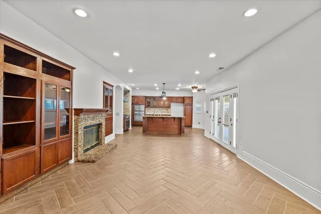 a view of a kitchen with furniture and a fireplace