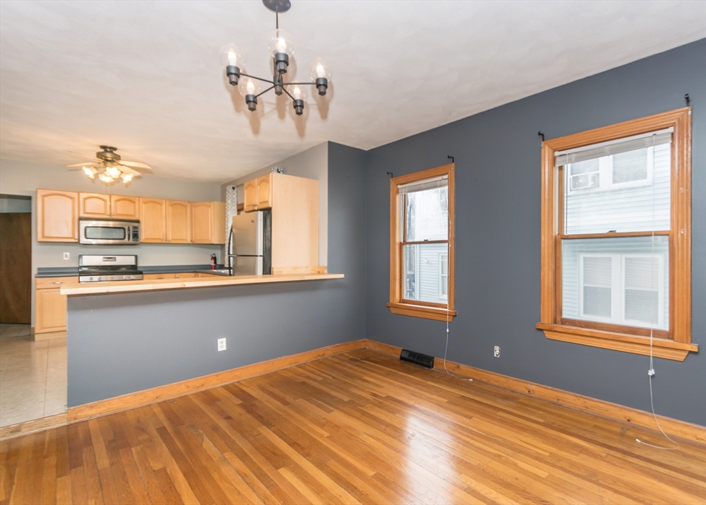 17 Cleveland Avenue, Unit 1 Everett, MA 02149 - Photo 11 of 20 a view of an empty room with a window