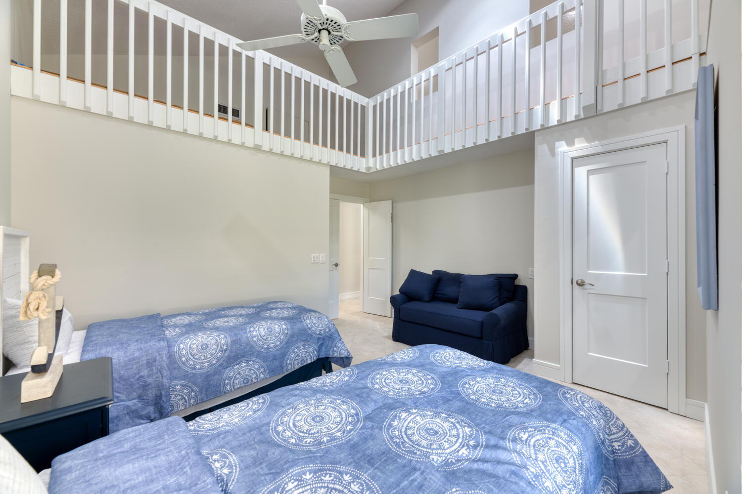 108 Seashore Drive Jupiter, FL 33477 - Photo 18 of 42 a bedroom with furniture and a window