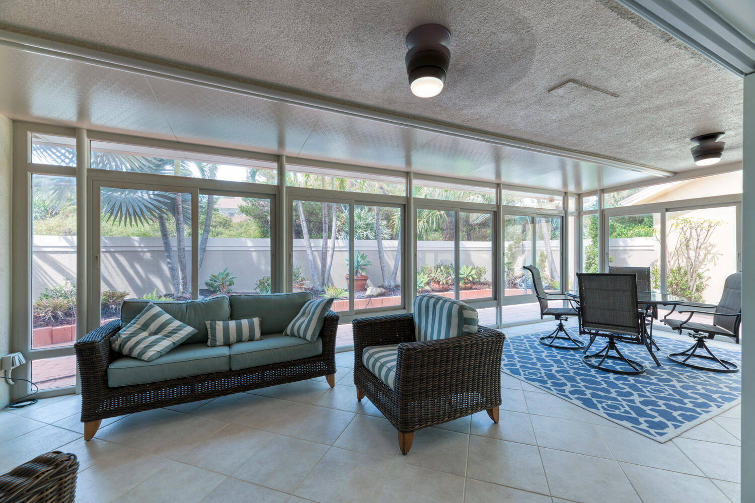 108 Seashore Drive Jupiter, FL 33477 - Photo 21 of 42 a living room with furniture and a large window