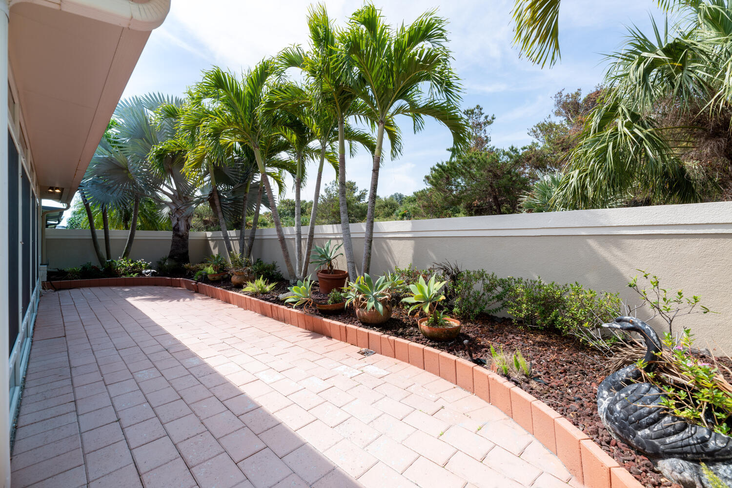 108 Seashore Drive Jupiter, FL 33477 - Photo 26 of 42 a view of a backyard