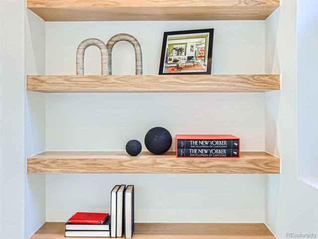 a view of cabinet with washer and dryer