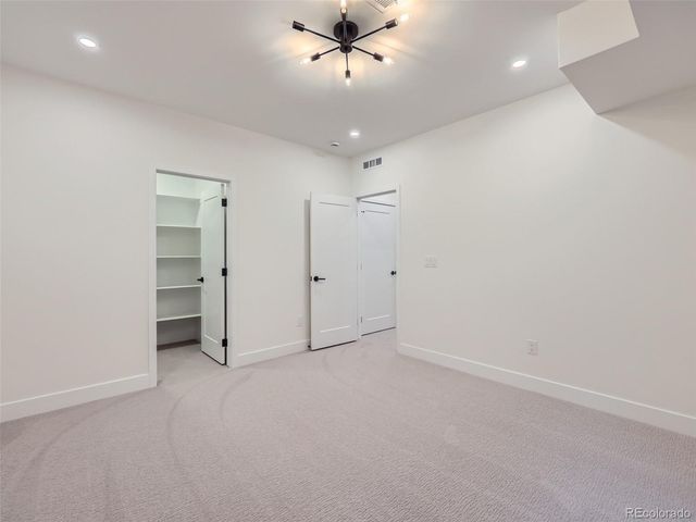 a front view of a house with a garden and porch