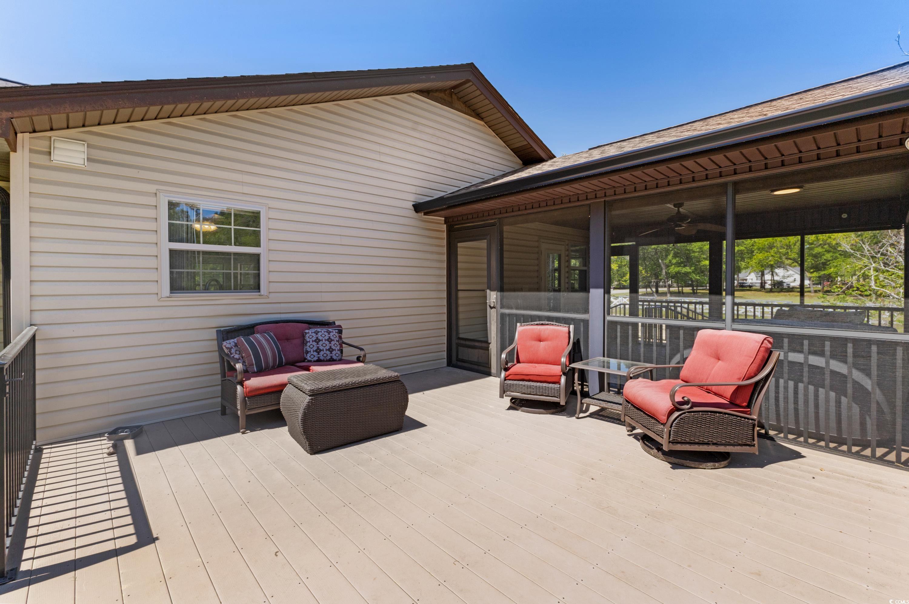 1869 Meadowood Lane Longs, SC 29568 - Photo 26 of 37 View of patio featuring outdoor lounge area and a deck