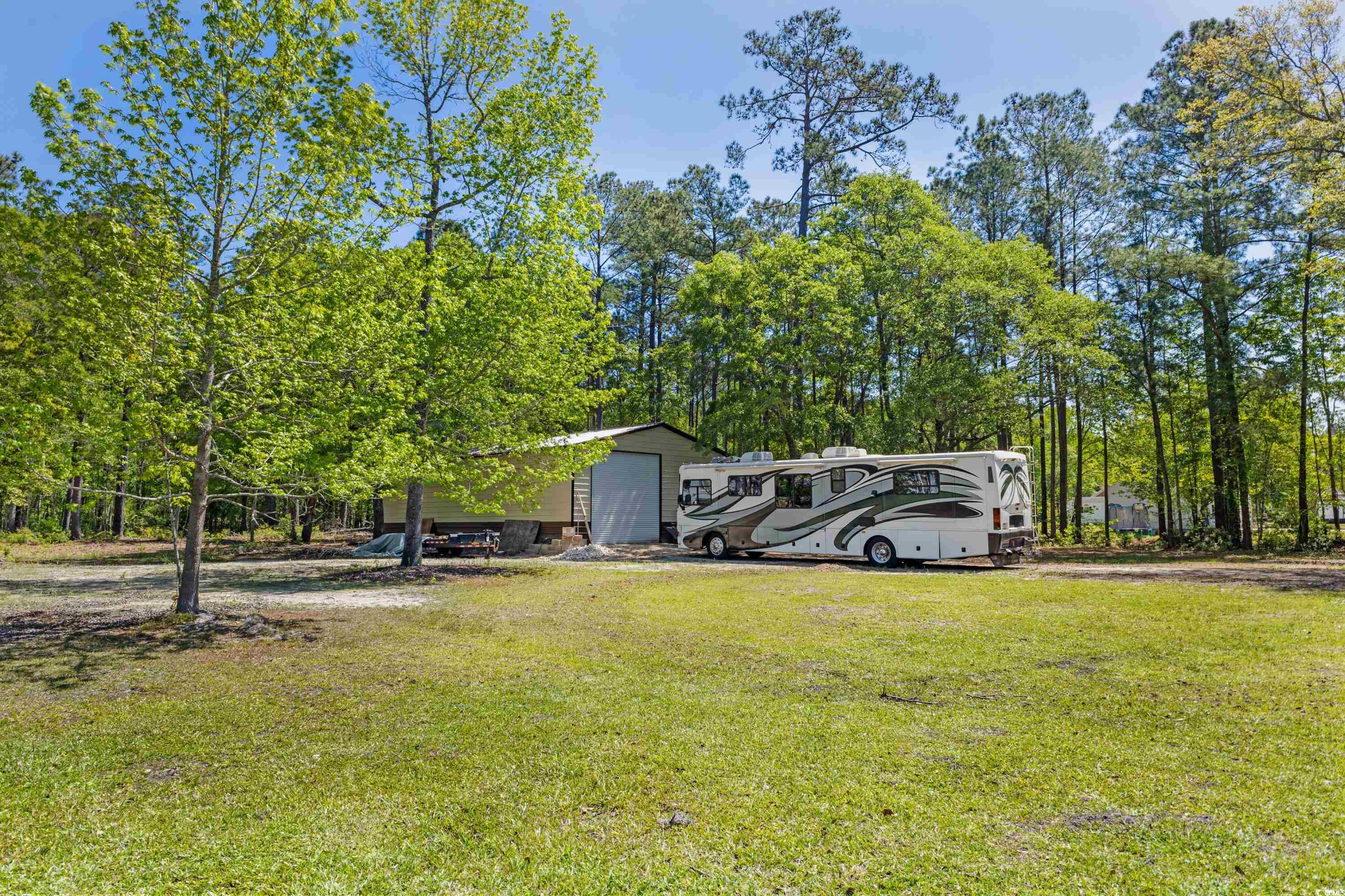 1869 Meadowood Lane Longs, SC 29568 - Photo 29 of 37 View of yard with an outbuilding
