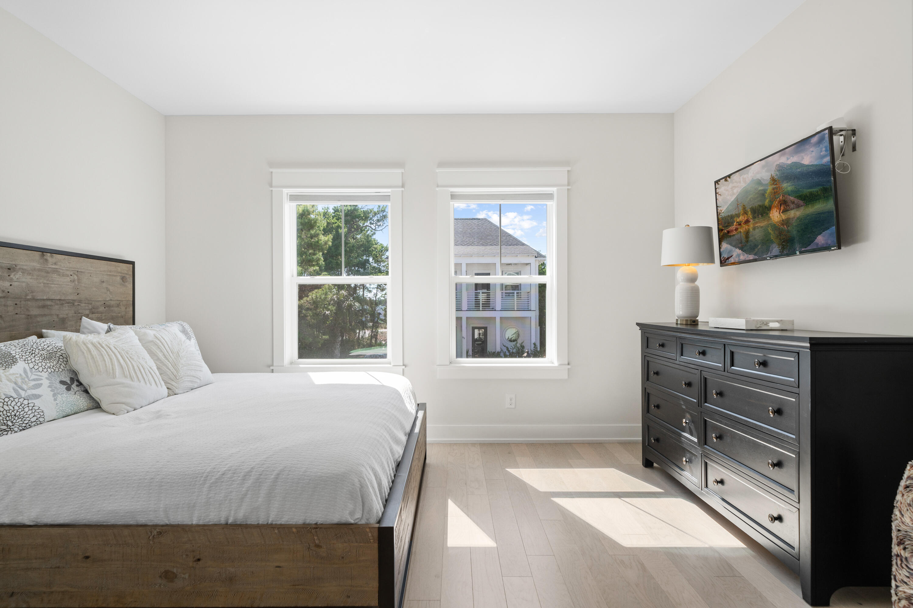 97 Beach View Drive Inlet Beach, FL 32461 - Photo 28 of 57 a bedroom with a bed and flat screen tv