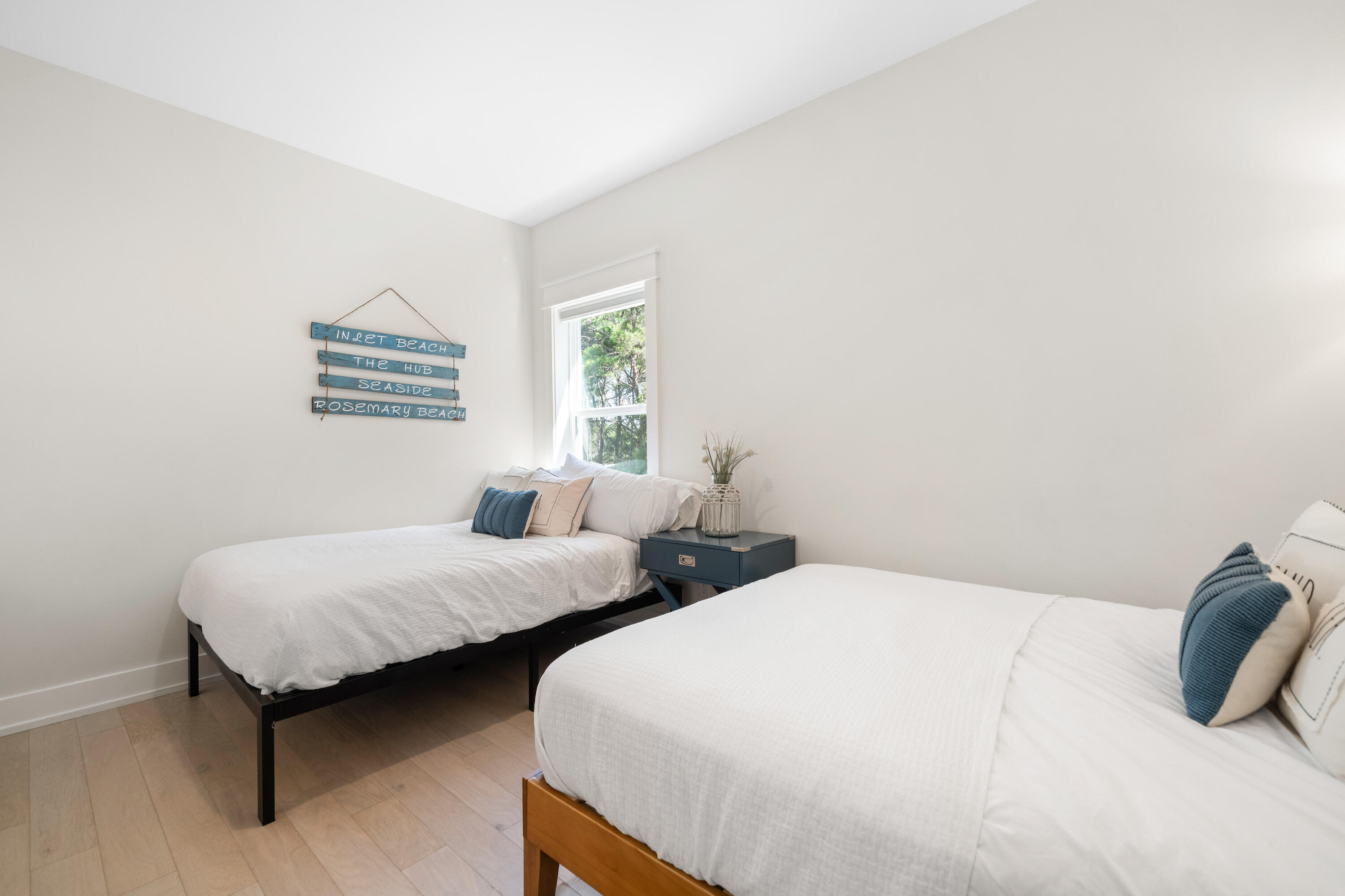 97 Beach View Drive Inlet Beach, FL 32461 - Photo 38 of 57 a bedroom with two beds and a window