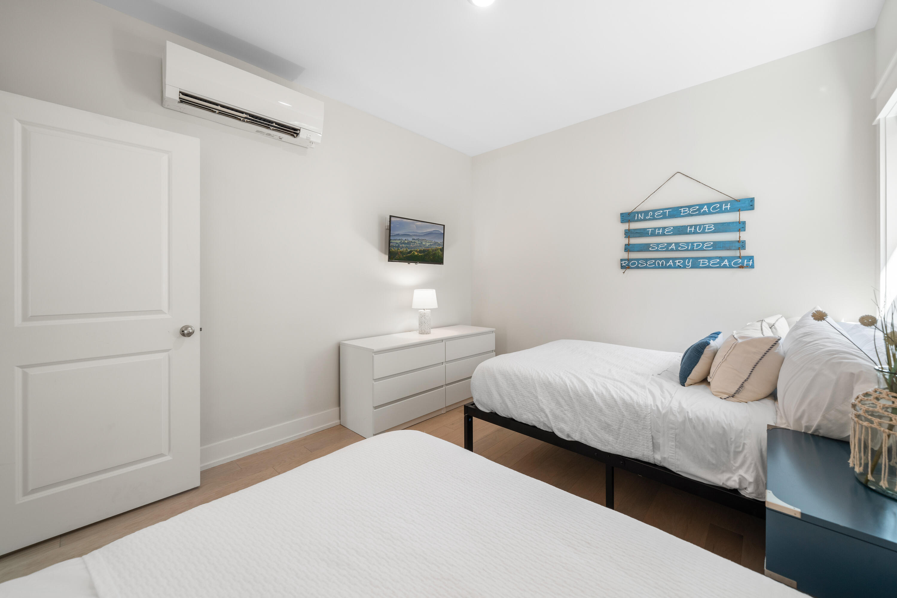 97 Beach View Drive Inlet Beach, FL 32461 - Photo 39 of 57 a bedroom with a bed and a night stand