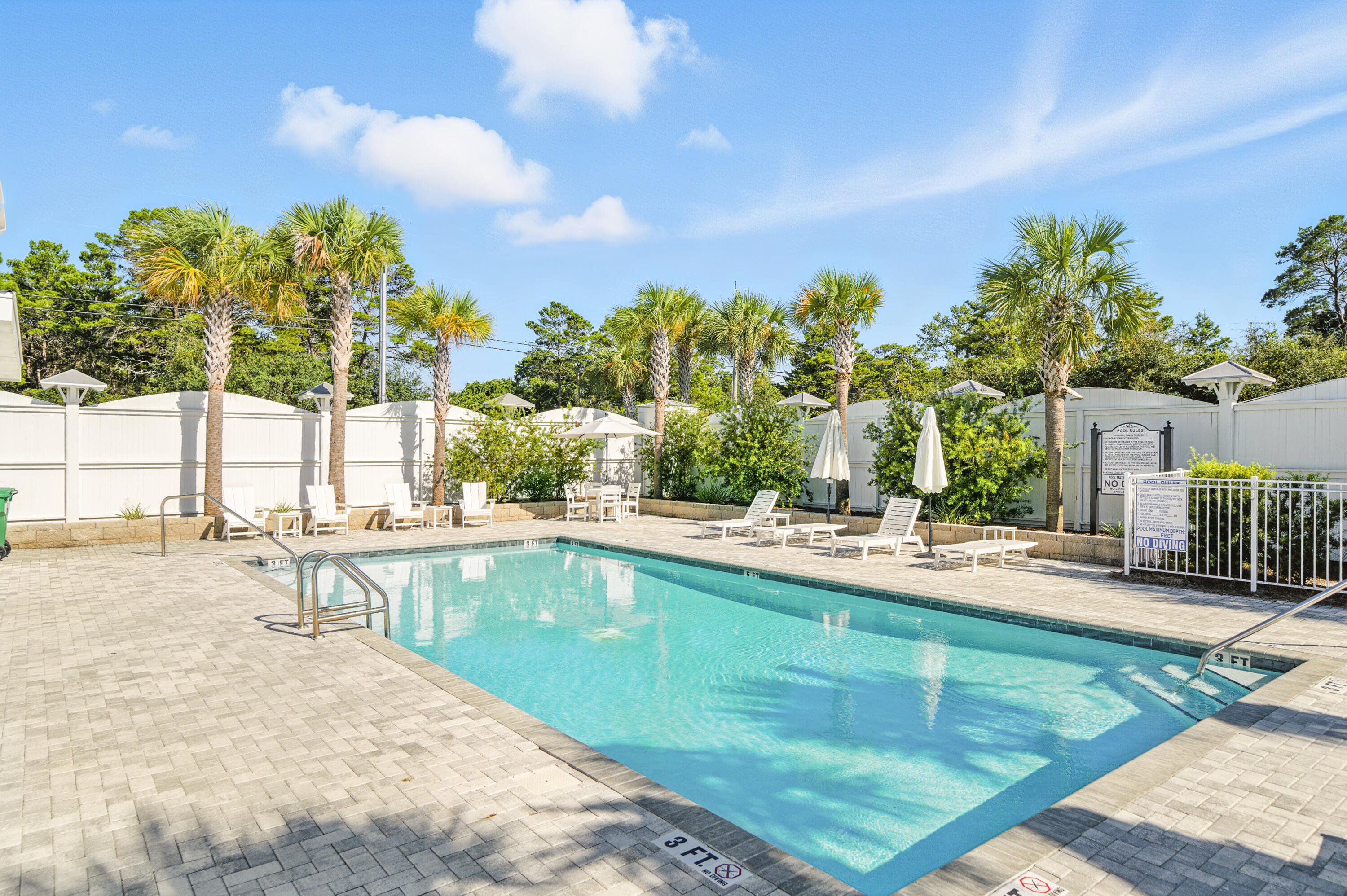 97 Beach View Drive Inlet Beach, FL 32461 - Photo 46 of 57 a view of a swimming pool and lounge chairs