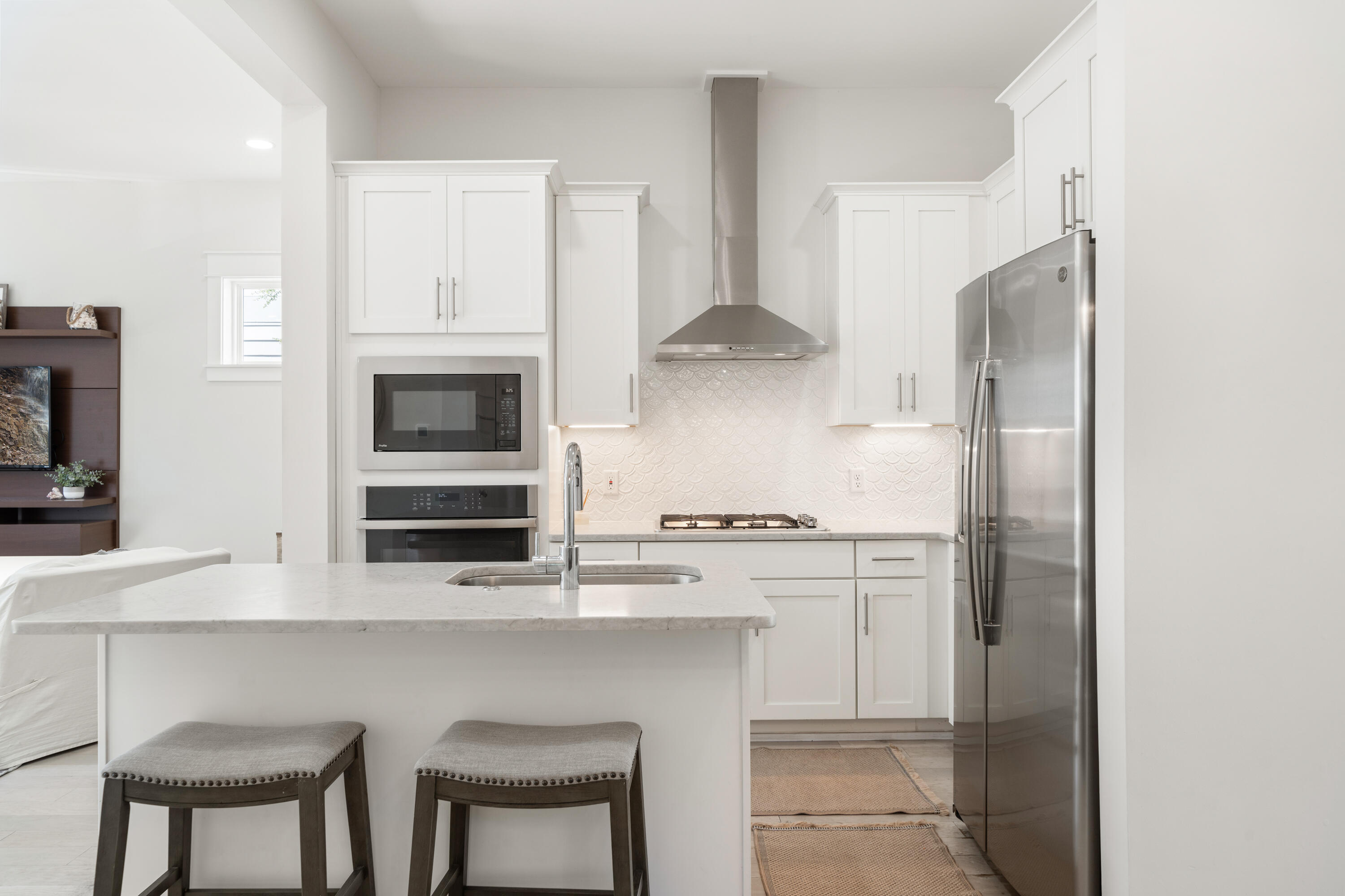 97 Beach View Drive Inlet Beach, FL 32461 - Photo 9 of 57 a kitchen with stainless steel appliances a stove microwave and cabinets
