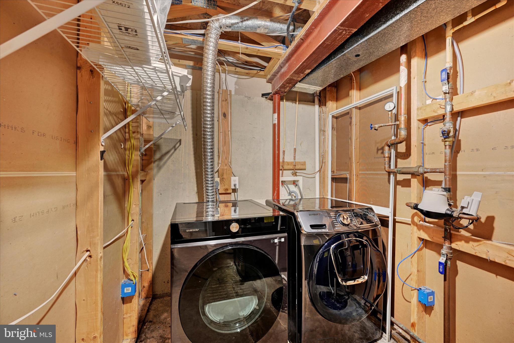 6119 Starburn Path Columbia, MD 21045 - Photo 21 of 28 a utility room with multiple dryer and washer