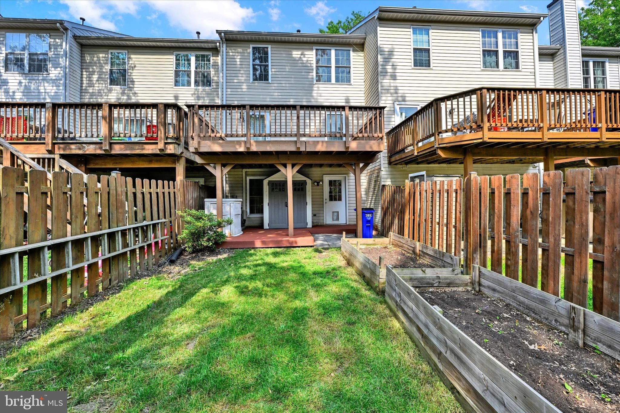 6119 Starburn Path Columbia, MD 21045 - Photo 26 of 28 front view of a house with a yard