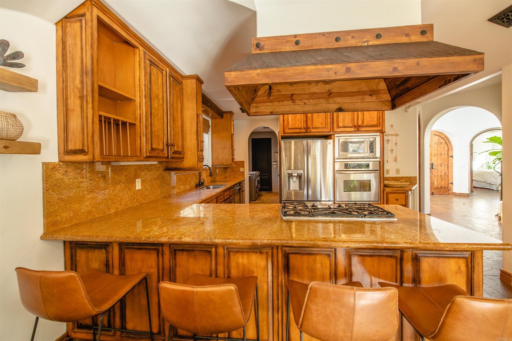 3209 James Drive Carlsbad, CA 92008 - Photo 15 of 65 a view of a living room with furniture and large windows
