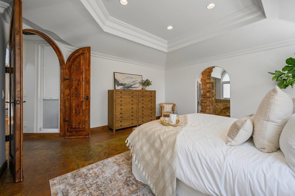 3209 James Drive Carlsbad, CA 92008 - Photo 24 of 65 a bedroom with a bed and a dresser