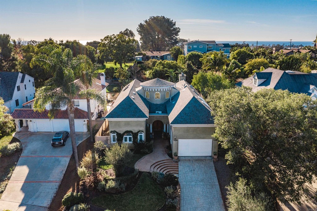 3209 James Drive Carlsbad, CA 92008 - Photo 58 of 65 a front view of a house with a yard