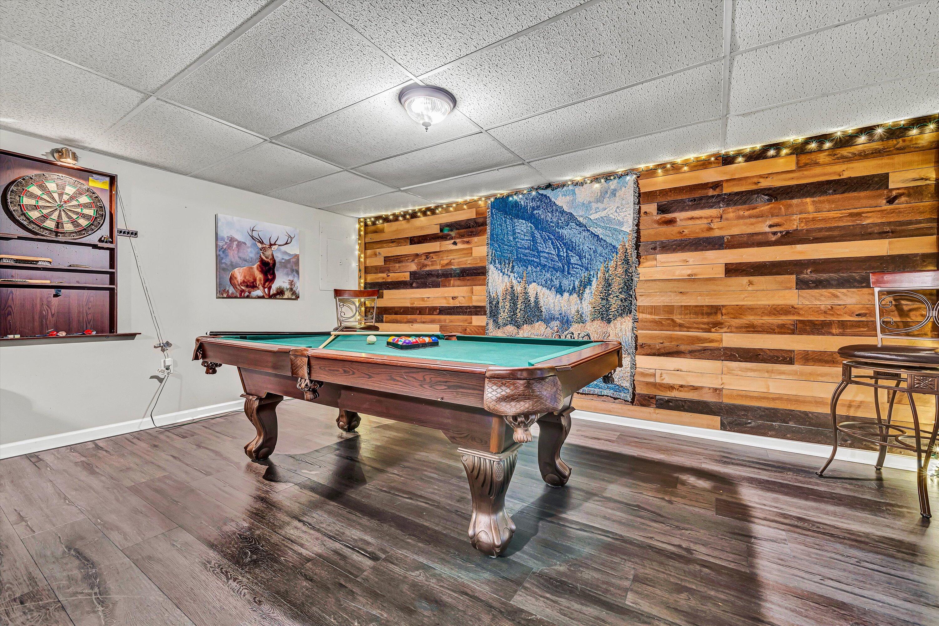 4070 Pitzer Road Roanoke, VA 24014 - Photo 18 of 25 a room with wooden furniture and paintings on wall