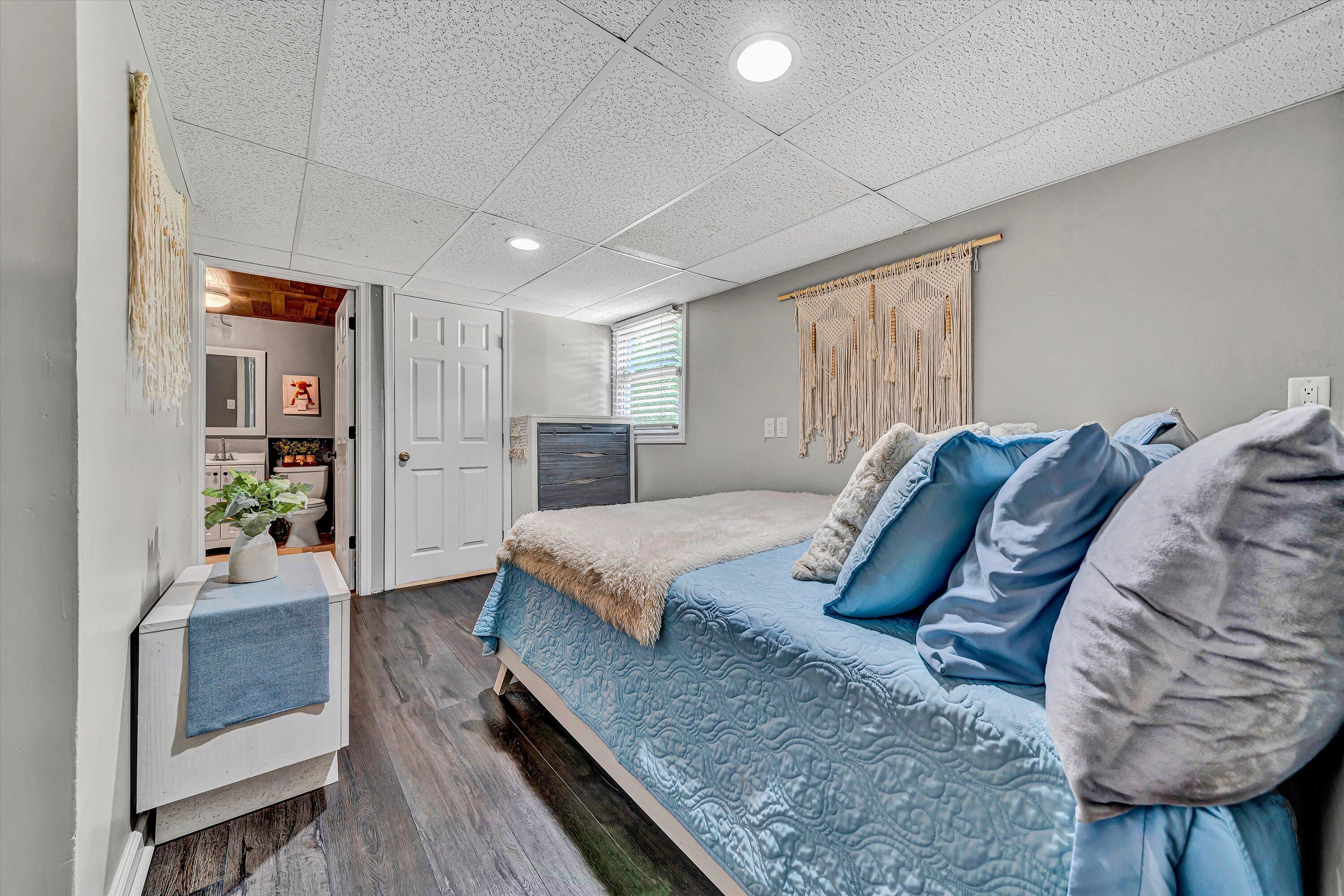 4070 Pitzer Road Roanoke, VA 24014 - Photo 19 of 25 a bedroom with a bed and a couch