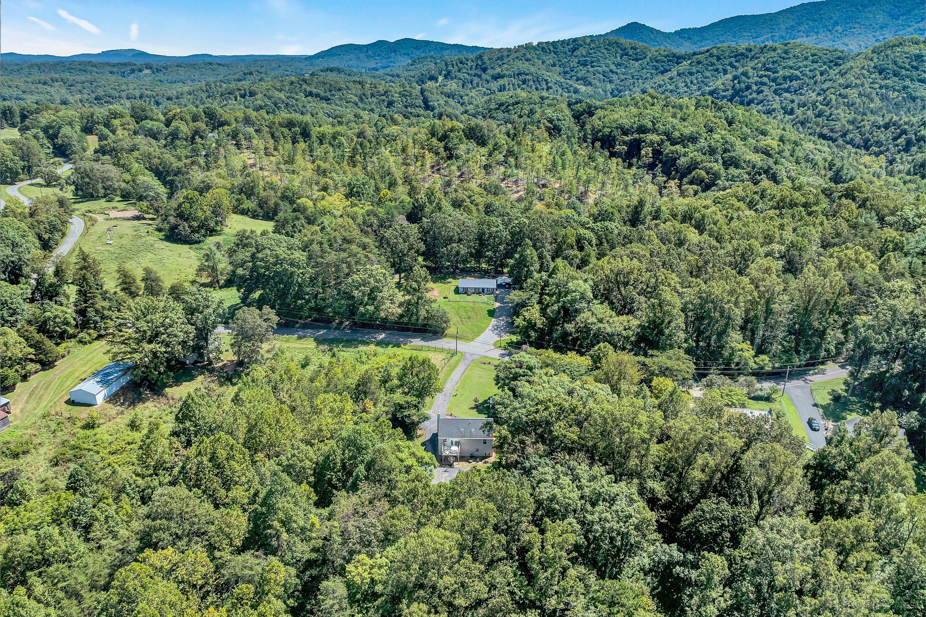 4070 Pitzer Road Roanoke, VA 24014 - Photo 25 of 25 a view of a forest with a street