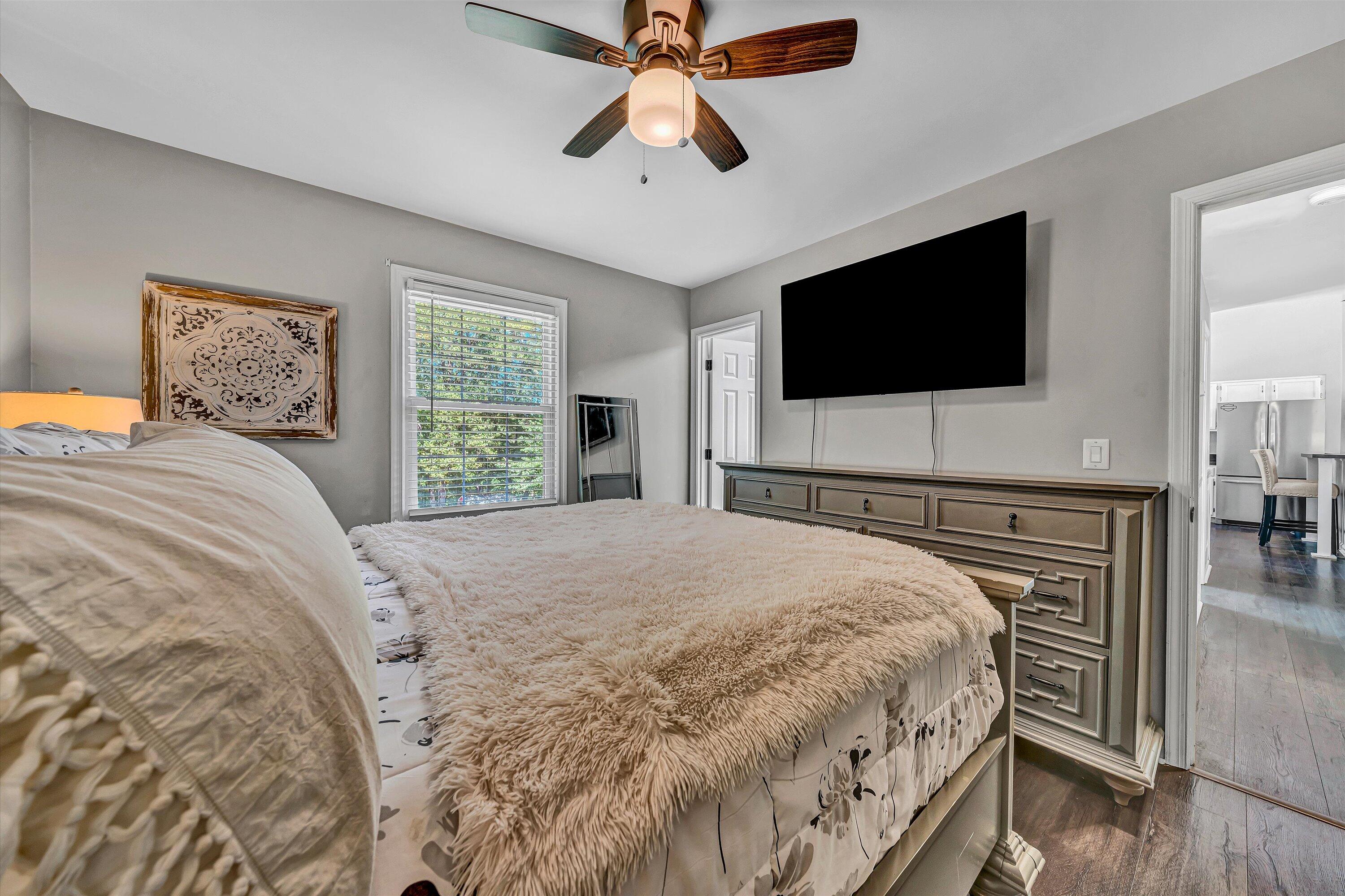 4070 Pitzer Road Roanoke, VA 24014 - Photo 10 of 25 a bedroom with a bed and a flat screen tv