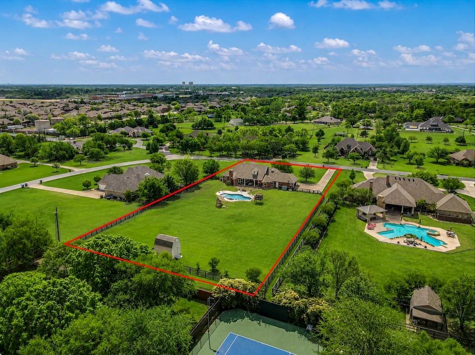 15 Trail Ridge Drive Melissa, TX 75454 - Photo 1 of 38 Expansive green lawn with mature trees and a swimming pool