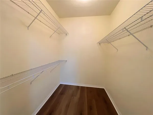 a view of a room with racks on the wall