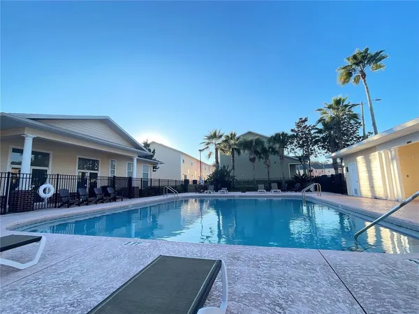 a view of a house with a swimming pool