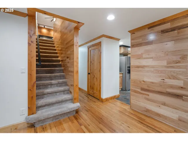 a view of entryway with wooden floor