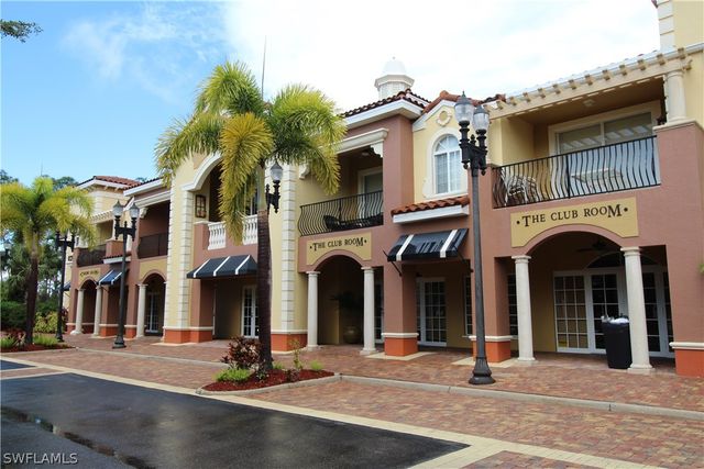 a view of a building with a tree