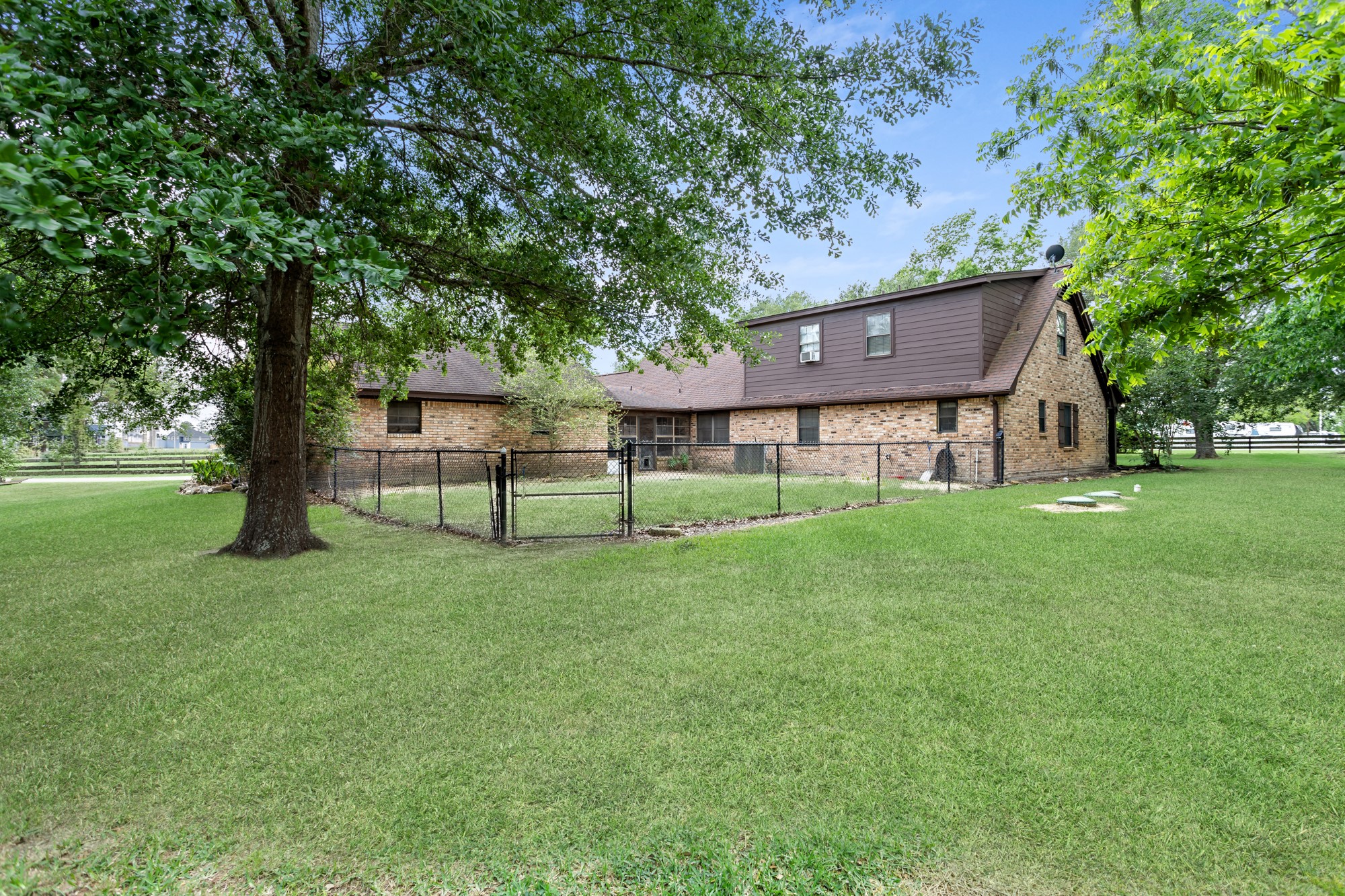1747 Farm To Market Road 365 Nome, TX 77629 - Photo 22 of 24 a view of a house with a yard