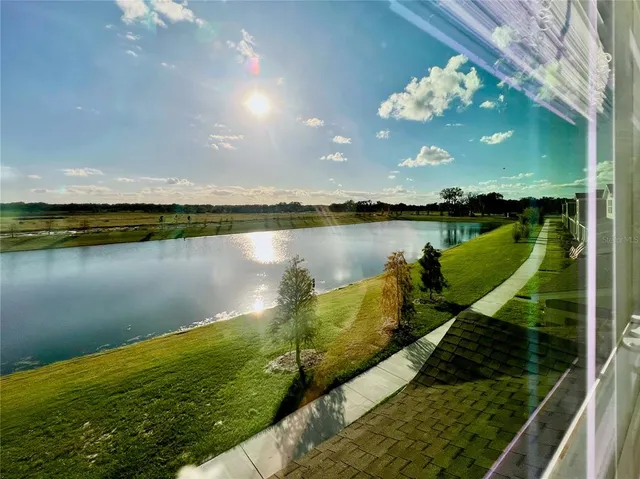 a view of a lake from a yard