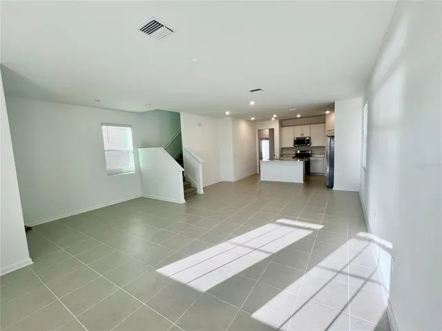 a view of kitchen and living room