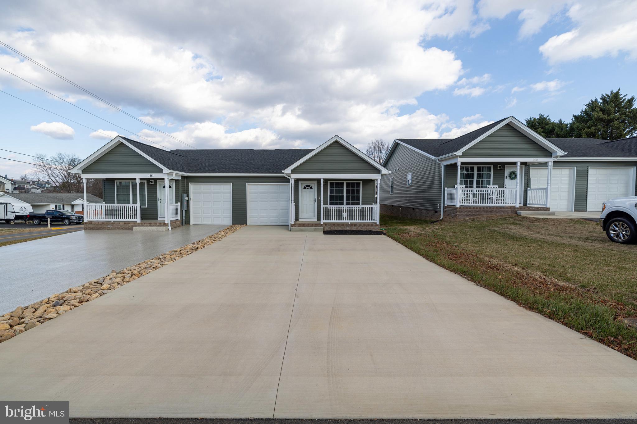 103 6th Avenue Luray, VA 22835 - Photo 30 of 58 a front view of a house with a yard