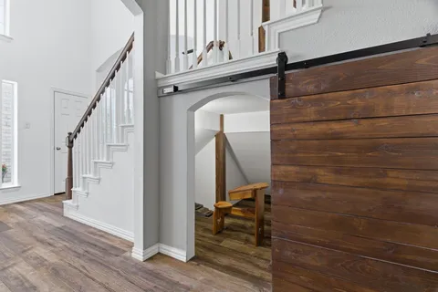 a view of front door door of stairs