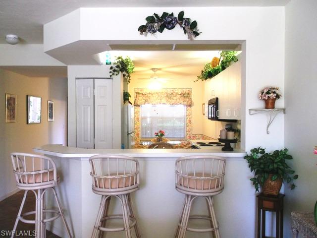 2460 Old Groves Road, Unit 102 Naples, FL 34109 - Photo 2 of 10 Gallery Image 2