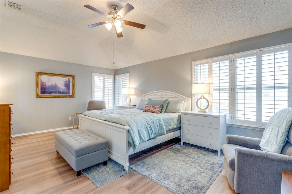 4816 Sleepy Ridge Circle Fort Worth, TX 76133 - Photo 22 of 36 Bedroom featuring light wood-type flooring and ceiling fan