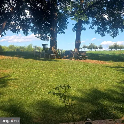 a view of an ocean with a yard