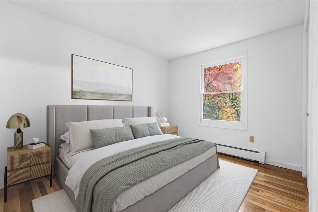 7 Westwood Road Natick, MA 01760 - Photo 6 of 11 a bedroom with a bed and a window