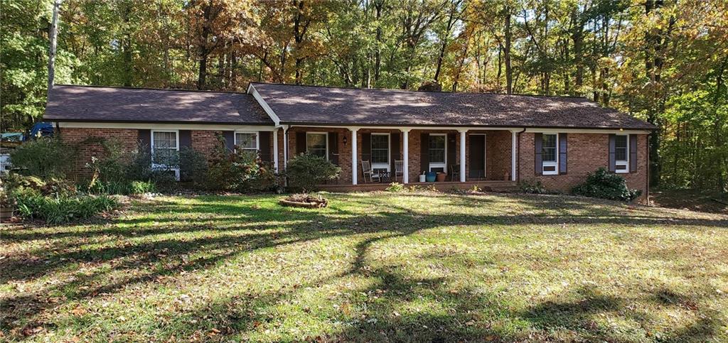 1709 Bethel Road Morganton, NC 28655 - Photo 1 of 21 a view of a house with a swimming pool