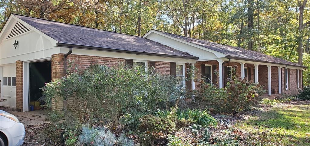 1709 Bethel Road Morganton, NC 28655 - Photo 2 of 21 a view of house with trees in the background